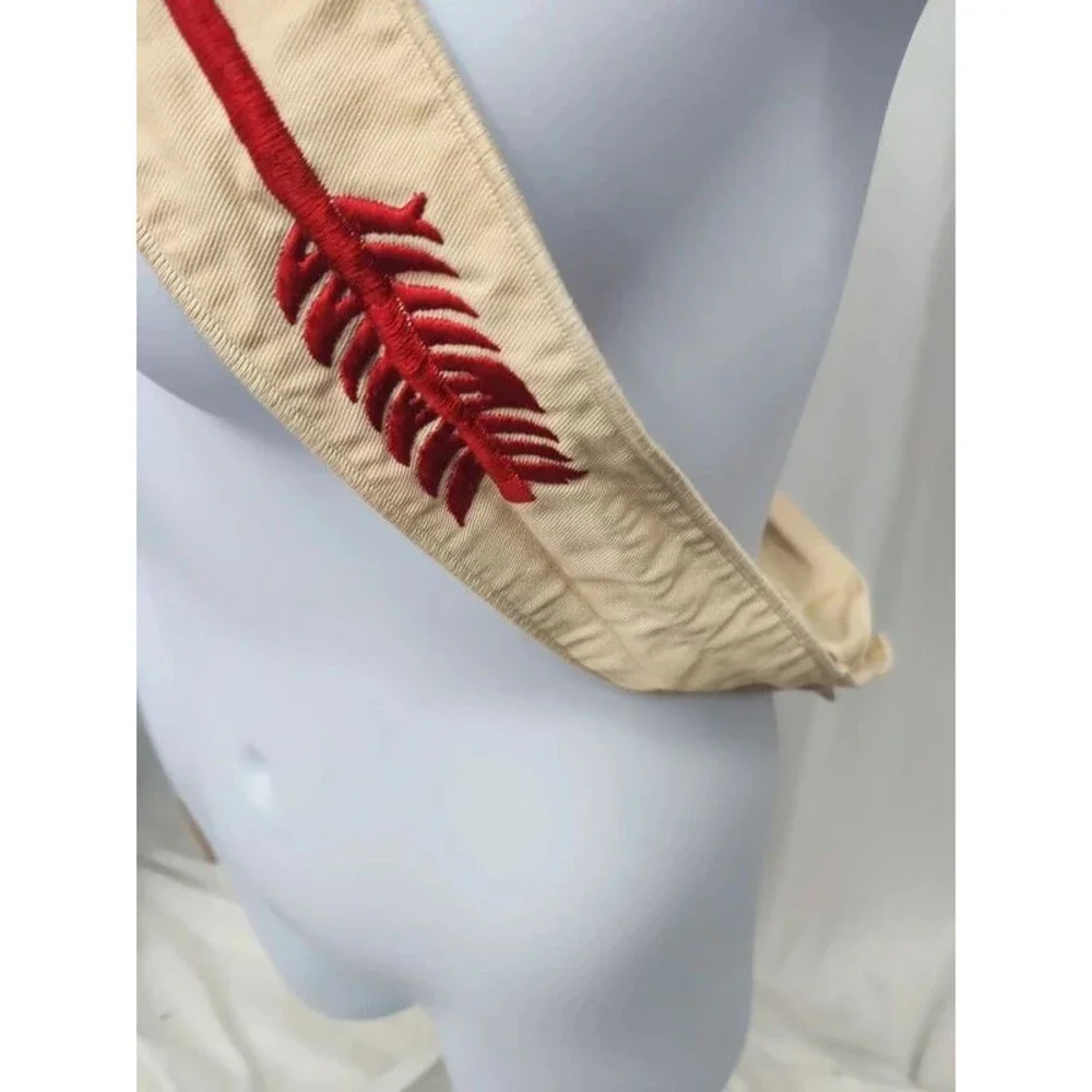 Boy scouts arriw sash 54 inches long